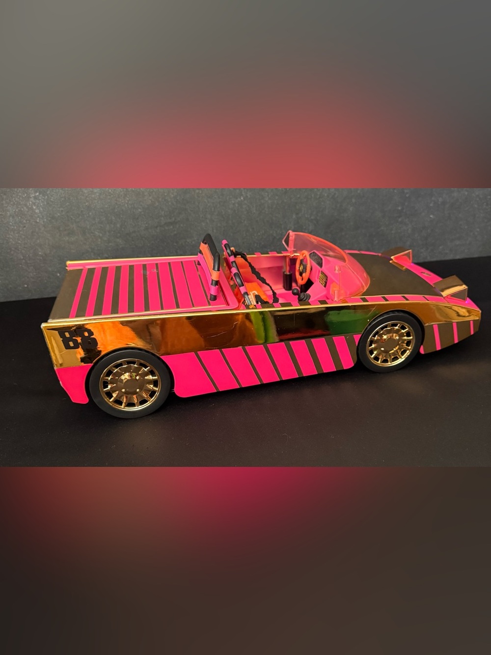 L.O.L. Surprise Car-Pool Coupe. Metallic Rose Gold/Hot Pink